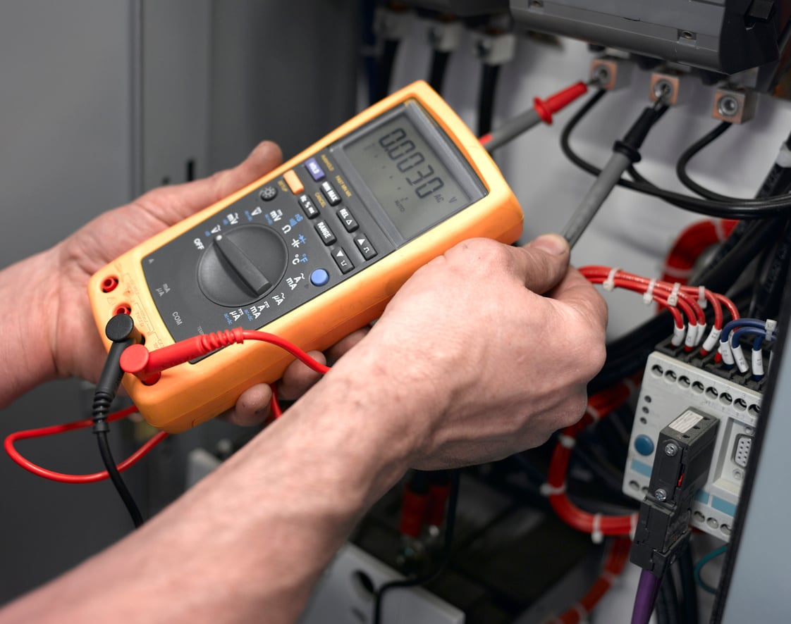 Person Conducting an Electrical Test 